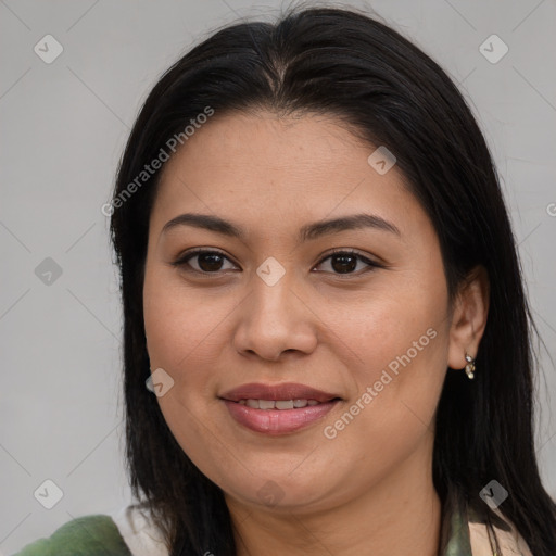 Joyful asian young-adult female with long  brown hair and brown eyes