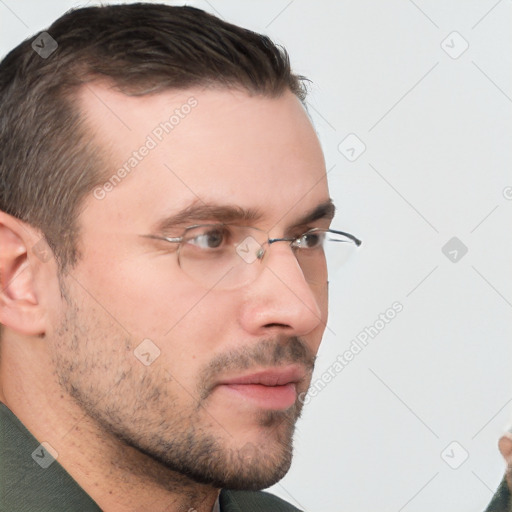 Neutral white young-adult male with short  brown hair and brown eyes