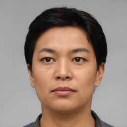 Neutral asian young-adult male with short  black hair and brown eyes