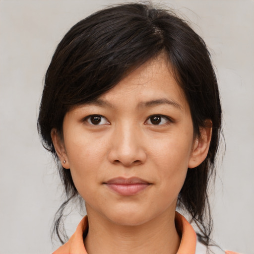 Neutral asian young-adult female with medium  brown hair and brown eyes