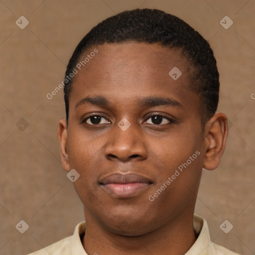 Joyful black young-adult male with short  brown hair and brown eyes