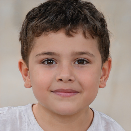 Joyful white child male with short  brown hair and brown eyes