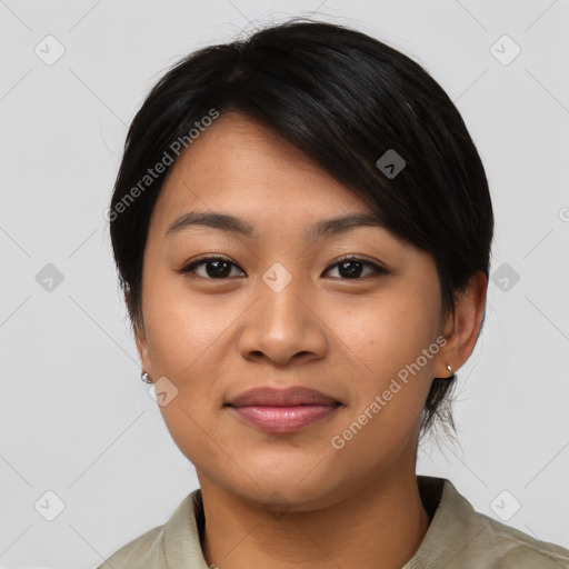 Joyful asian young-adult female with medium  black hair and brown eyes