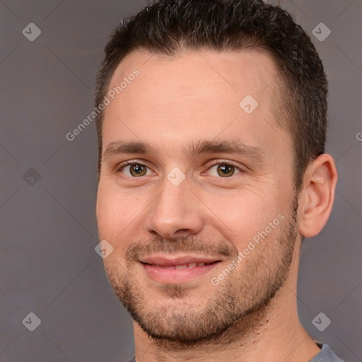 Joyful white young-adult male with short  brown hair and brown eyes