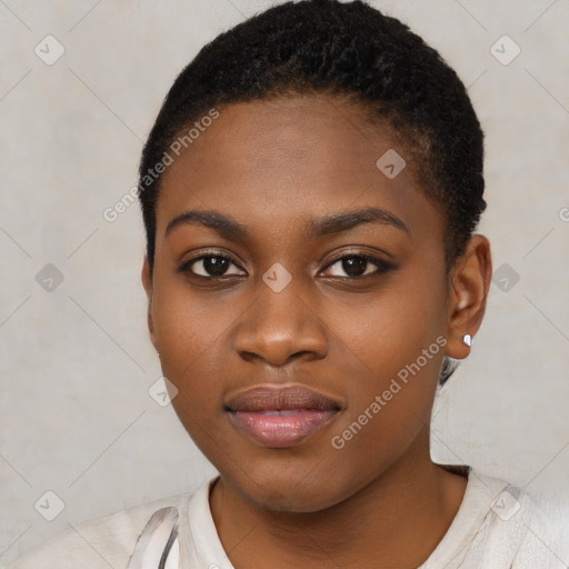 Joyful black young-adult female with short  black hair and brown eyes