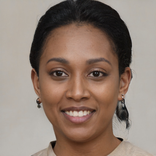 Joyful latino young-adult female with medium  black hair and brown eyes