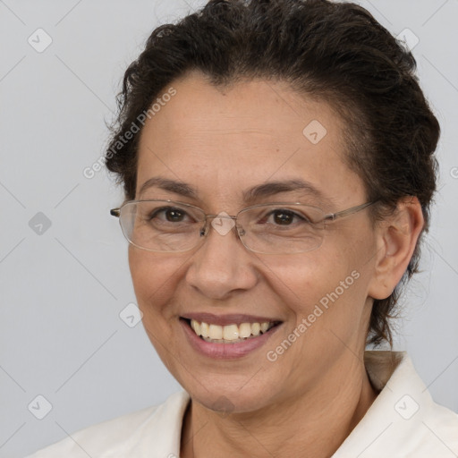 Joyful white adult female with short  brown hair and brown eyes