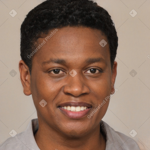 Joyful black young-adult male with short  brown hair and brown eyes