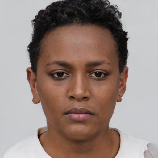Neutral black young-adult female with short  black hair and brown eyes