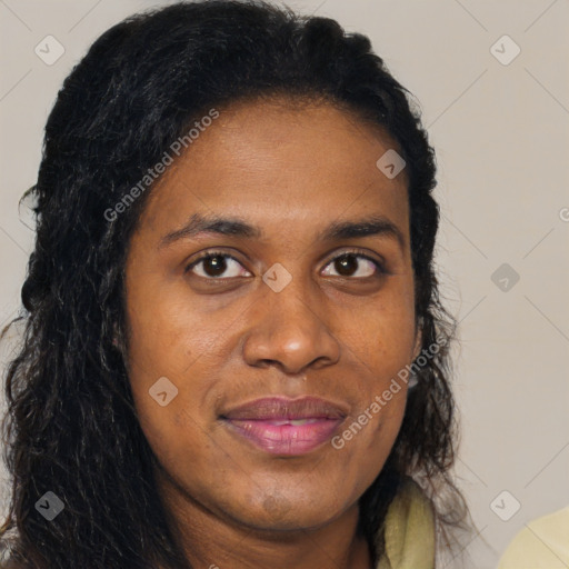 Joyful black young-adult female with long  brown hair and brown eyes