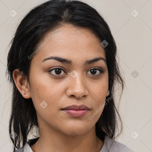 Joyful latino young-adult female with medium  black hair and brown eyes