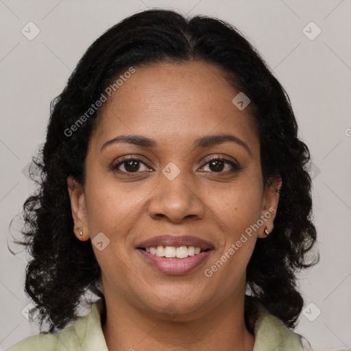 Joyful black young-adult female with medium  brown hair and brown eyes