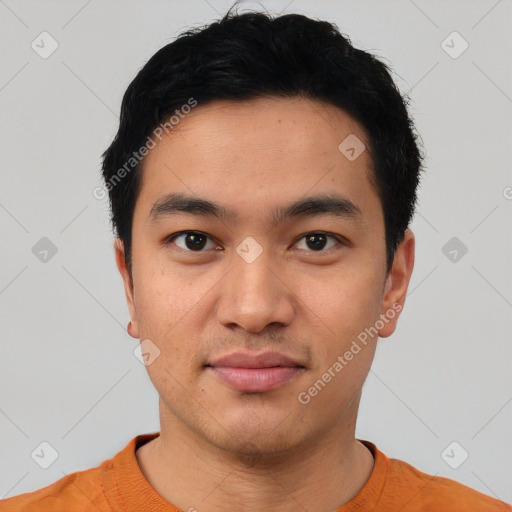 Joyful asian young-adult male with short  black hair and brown eyes