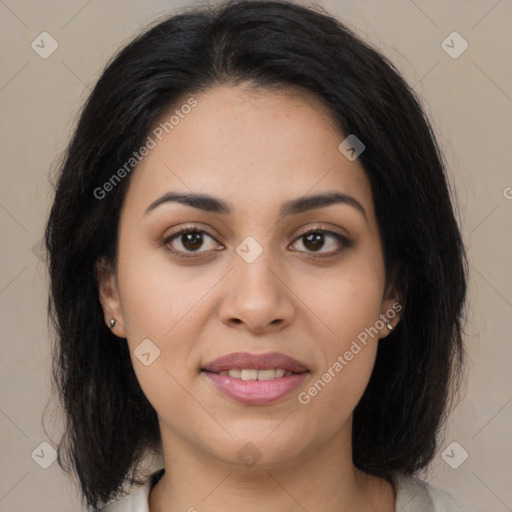 Joyful latino young-adult female with medium  brown hair and brown eyes