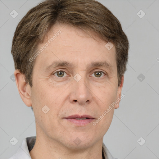 Joyful white adult male with short  brown hair and grey eyes