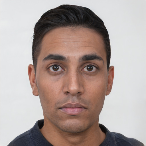 Neutral white young-adult male with short  black hair and brown eyes