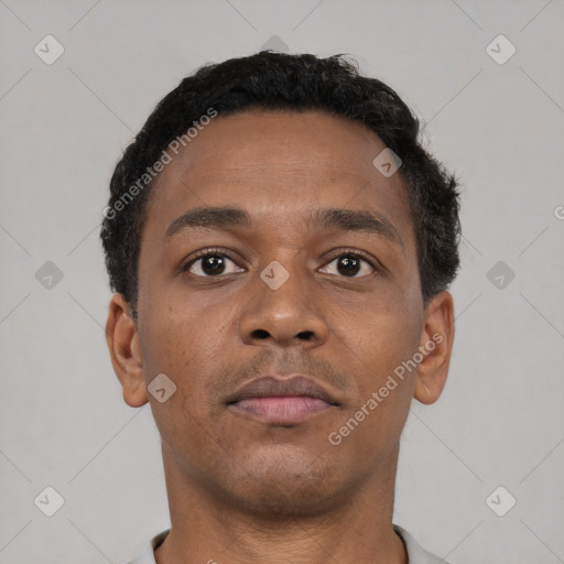 Neutral black young-adult male with short  brown hair and brown eyes