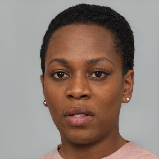Neutral black young-adult female with short  black hair and brown eyes