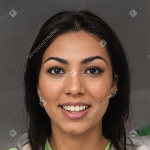 Joyful latino young-adult female with medium  brown hair and brown eyes