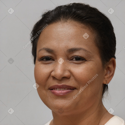 Joyful white adult female with short  brown hair and brown eyes