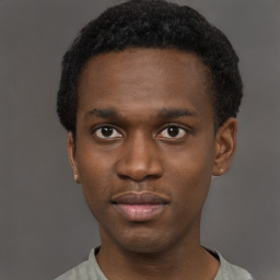 Neutral black young-adult male with short  brown hair and brown eyes