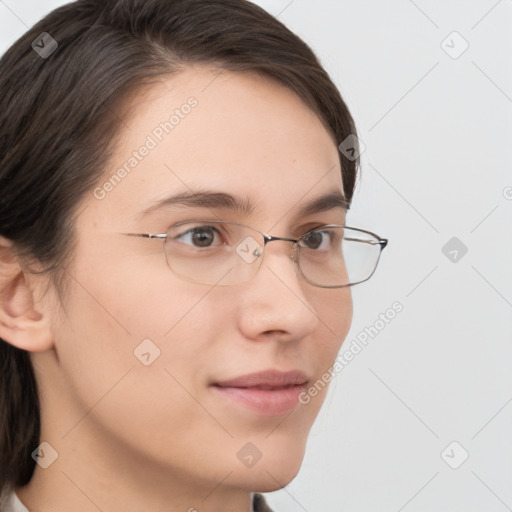 Neutral white young-adult female with medium  brown hair and brown eyes