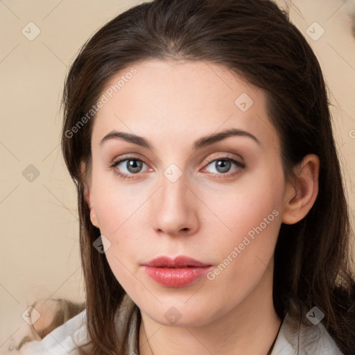 Neutral white young-adult female with long  brown hair and brown eyes