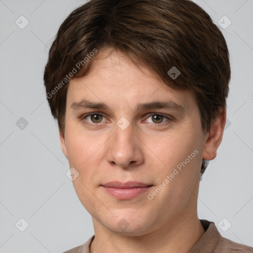 Joyful white young-adult female with short  brown hair and grey eyes