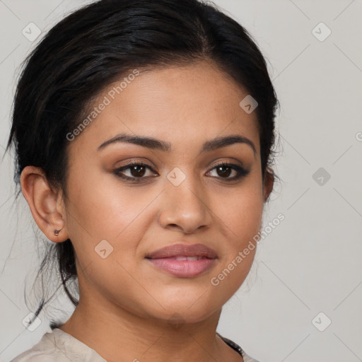 Joyful latino young-adult female with medium  brown hair and brown eyes