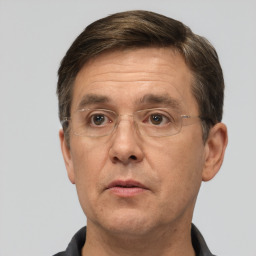 Neutral white adult male with short  brown hair and brown eyes