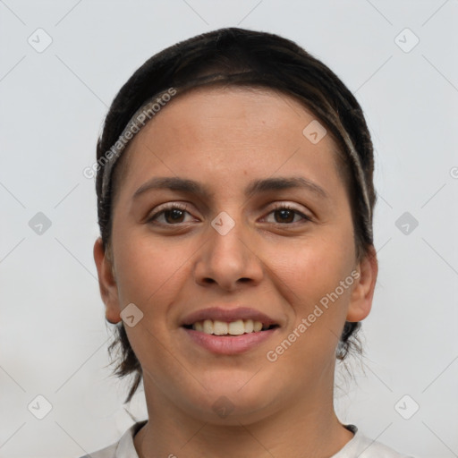 Joyful white young-adult female with short  brown hair and brown eyes