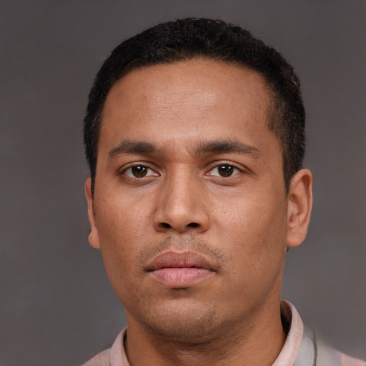 Neutral latino young-adult male with short  brown hair and brown eyes