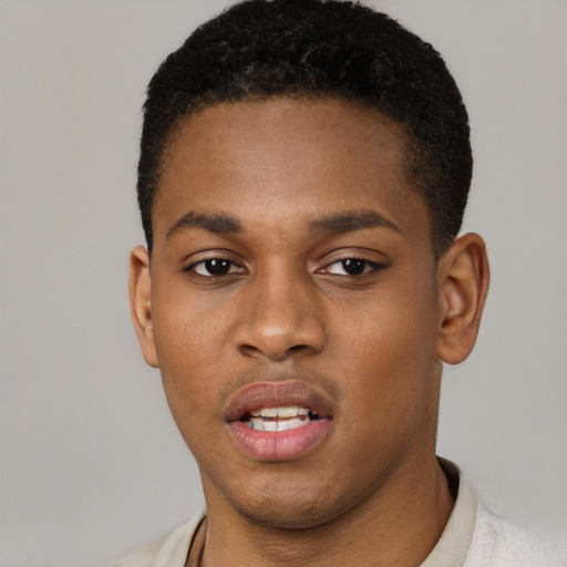 Neutral black young-adult male with short  black hair and brown eyes