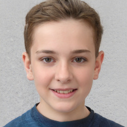 Joyful white child female with short  brown hair and brown eyes