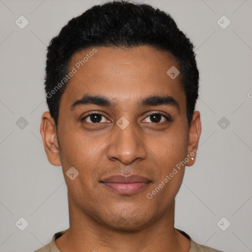 Joyful latino young-adult male with short  black hair and brown eyes