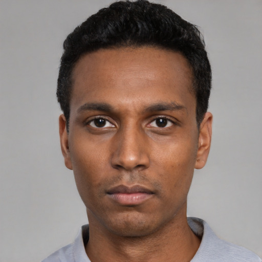 Neutral black young-adult male with short  black hair and brown eyes
