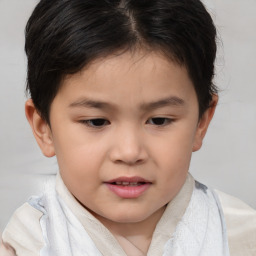 Joyful white child female with short  brown hair and brown eyes