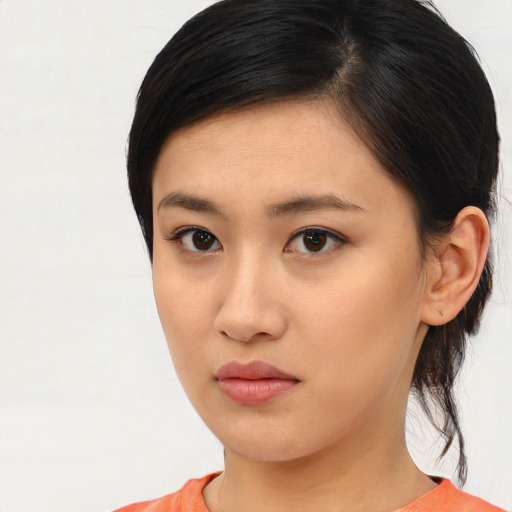 Neutral asian young-adult female with medium  black hair and brown eyes