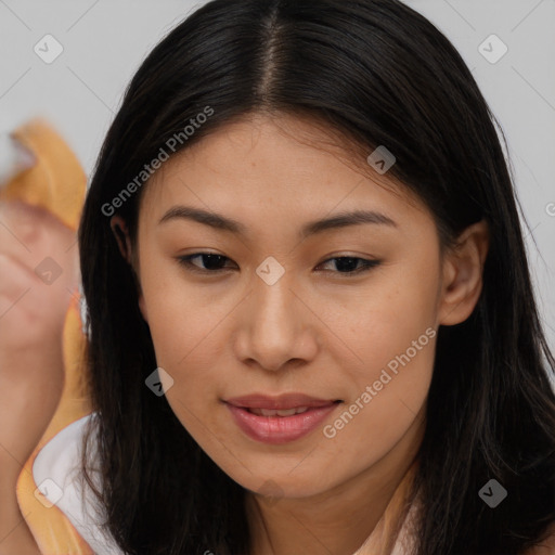 Joyful asian young-adult female with long  brown hair and brown eyes