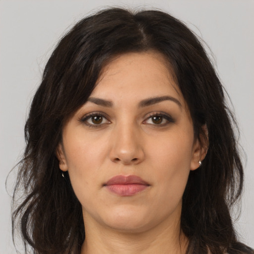 Neutral white young-adult female with long  brown hair and brown eyes
