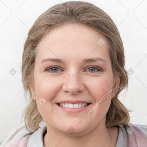 Joyful white young-adult female with medium  brown hair and blue eyes