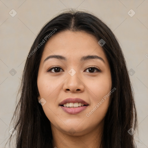 Joyful asian young-adult female with long  brown hair and brown eyes