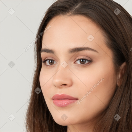 Neutral white young-adult female with long  brown hair and brown eyes