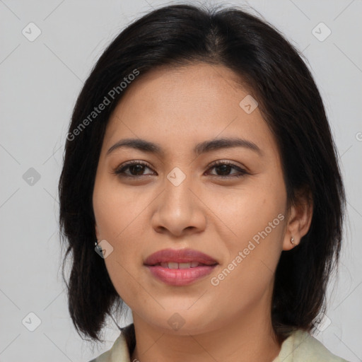 Joyful asian young-adult female with medium  brown hair and brown eyes