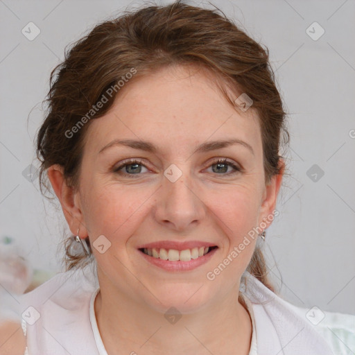 Joyful white young-adult female with medium  brown hair and blue eyes