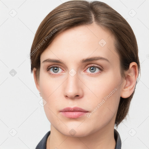 Neutral white young-adult female with medium  brown hair and grey eyes