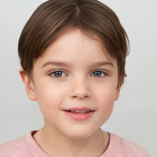 Joyful white child female with short  brown hair and brown eyes