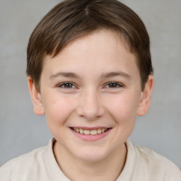 Joyful white child female with short  brown hair and brown eyes