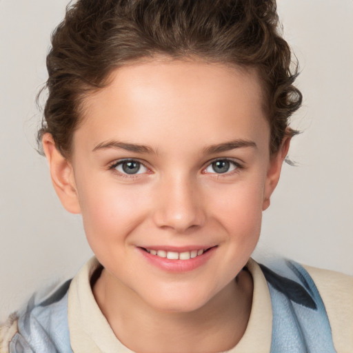 Joyful white child female with short  brown hair and brown eyes