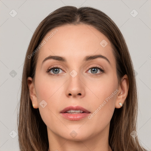 Joyful white young-adult female with long  brown hair and grey eyes